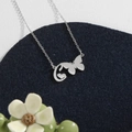 Polished stainless steel necklace featuring silver butterfly and heart charm pendant - Silver C