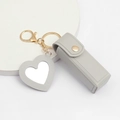 Detail of light grey PU leather heart keychain with lipstick holder and mini mirror - Gray