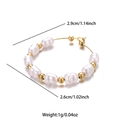 Macro detail of pearl hoop earring showing 2.9cm dimensions and golden beads - Beaded Pearl Hoop