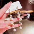 Boucles d'oreilles élégantes avec perles blanches en cascade et tiges en argent 925 pur - Argent Perle Pompon