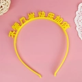 Yellow birthday party headband with happy birthday message and inner grip teeth - Yellow Forever Young Slogan