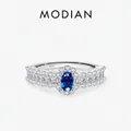 Luxuriöser S925 Sterlingsilber Ring mit blauem ovalem Saphir und brillanten Zirkonia-Steinen - US Größe 5 / Silber