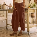 Détail d'un pantalon sarouel marron vintage avec taille élastique et grandes poches - Café