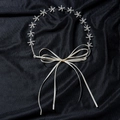 Dettaglio di copricapo a stella marina dorata con strass e nastro di raso bianco - Solo Fascia per Capelli / Argento