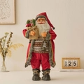 Babbo Natale in piedi con cappotto rosso, sacco di regali e lanterna decorativa - 60CM