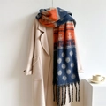 Detail of knitted scarf with polka dots and tassels over a beige winter coat - WT104-4 Navy Orange