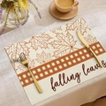 Fall placemat with brown maple leaf pattern and falling leaves text on linen texture - Brown White Plaid Falling Leaves
