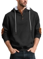 Detail van wafelgebreide hoodie met knoopsluiting en contrasterende oranje elleboogstukken - S / Zwart