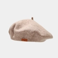 Detailed close-up of beige wool beret featuring a vintage Love Style leather patch - Mocha