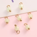 Light green faceted glass bead charms with golden loops for DIY jewelry making - Light Green Bicone Bead