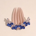 Dettaglio del pettine per capelli in oro rosa con gemme blu a goccia e strass lucidi - Pettine a Goccia d'Acqua Blu Chiaro Oro Rosa