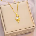 Elegant gold titanium heart necklace featuring a brilliant white zircon central stone - 6068 Curve Heart / Gold