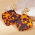 Detail of square tortoiseshell resin earrings with gold diamond textured studs on stone - Silver Earring Post - Coffee Tortoiseshell Pattern