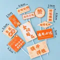 10-piece vibrant orange graduation cake topper set with motivational student messages - Victory Pig Style