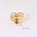 Detailed view of gold star ring with pink stone inlay showing 15mm size and 1.8g weight - Rhodonite