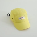 Detail of yellow quick-dry camper cap featuring a cute duck patch and adjustable D-ring strap - 52cm / Yellow