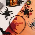 Halloween headband with 3D black velvet spiders on silver springs over a festive background - Spring Spider Headband