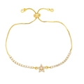 Macro shot of adjustable gold star bracelet with cubic zirconia and slide buckle closure - Pink