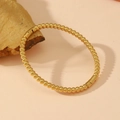 Polished gold beaded bracelet with clasp displayed on a textured natural rock pedestal - Gold Round Bead Style (S509)