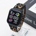 Digital sports watch with square black face and leopard print fabric scrunchie strap - Leopard Print
