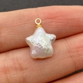 Star shaped natural freshwater pearl pendant with gold loop connector on fingertip - Pentagram Star 12x16mm