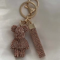 Sparkling keychain with a rose gold crystal bear figurine and a glittery strap - Champagne