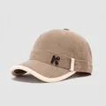Detailed close-up of premium corduroy texture and golden letter K badge on kids baseball cap - 50cm (1-3 Years) / Khaki