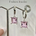 Silver drop earrings with pink square cubic zirconia stones on a fashion display card - Pink Diamond Square Earrings Led-103