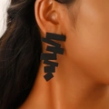 Exaggerated black leaf-shaped earrings with irregular folded texture and matte finish - Geometric Serrated Long Style (N-135) / Matte Black