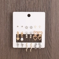 Set of 9 pairs of gold and silver earrings with crosses hearts and rhinestones on card - Rhinestone Star Cross Heart Lightning Snake 9 Pairs Set