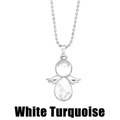 Detail of silver angel wing pendant featuring a teardrop white turquoise gemstone - Howlite
