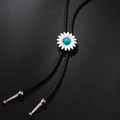 Western bolo tie with white daisy pendant and turquoise stone on black braided cord - Sapphire Flower Necklace