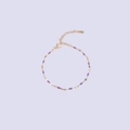 Detail of gold chain bracelet featuring purple enamel charms and adjustable lobster clasp - Gold+Purple