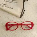 Kids trendy oval red full-frame sunglasses with UV400 protection and blue light blocking - Transparent Red White Lens