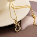 Exquisite 18K gold plated crown heart pendant necklace on a white porcelain cup edge - Crown Hollow Heart Style (24078)