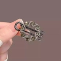 Macro shot of a gunmetal hair claw clip featuring large grey crystals and white rhinestones - 18# Hollow Round Rhinestone Duckbill Clip (Approx. 4.2CM)
