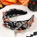Detail of Halloween knotted headband with skull print, orange beads and rhinestones - Knotted Skull Black Style With Pearls