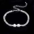 Detailed macro view of silver bridal bracelet with sparkling rhinestones on black background - 838 Bracelet / Silver