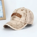 Close-up of distressed cotton baseball cap with Venezia embroidery and ripped details - Off White