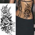Black and white rose flower temporary tattoo sticker shown on paper and a model's back - Pattern BK-016