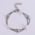 Double-layered silver titanium steel bracelet with natural freshwater pearls and tag - Silver