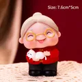 Cute grandmother figurine with white cat wearing red Tang suit for birthday decoration - Vinyl Grandma with Cat