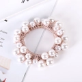 Detail of hand-woven beige elastic hair tie with assorted white pearls and shiny rhinestones - 4# Beige Woven Faux Pearl Hair Tie