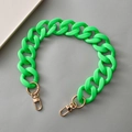 Close-up of matte neon green acrylic chain links with gold metal lobster clasps for bags - Fluorescent Green
