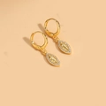 Macro view of gold marquise earrings featuring white zircon inlay and religious embossing - Oval Virgin Mary