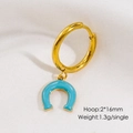Detailed macro view of a single golden hoop earring with light blue enamel horseshoe charm - Enamel Horseshoe U-shape