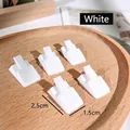 Set of 5 white plastic ring display stands on a wooden tray for jewelry organization - White