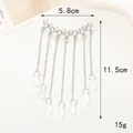 Tabella delle taglie dettagliata con larghezza 5,8 cm e lunghezza 11,5 cm del ciondolo a nappa - Nappina con Gemma Bianca