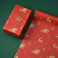 Christmas kraft wrapping paper featuring golden reindeer and Santa on a red background - Elk Sleigh