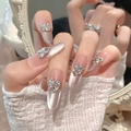 Uñas postizas almendradas largas con gel ojo de gato rosa y pedrería de lazo 3D - XS / Estilo Ovalado Largo (285)